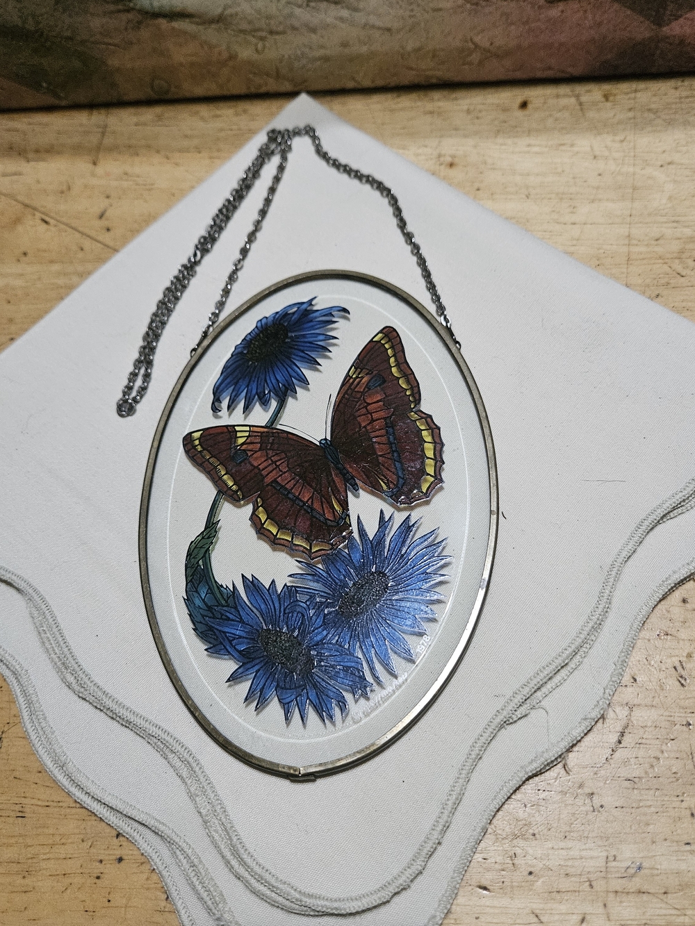 Oval Butterfly & Blue Flower Wall Decor - Brown and Blue